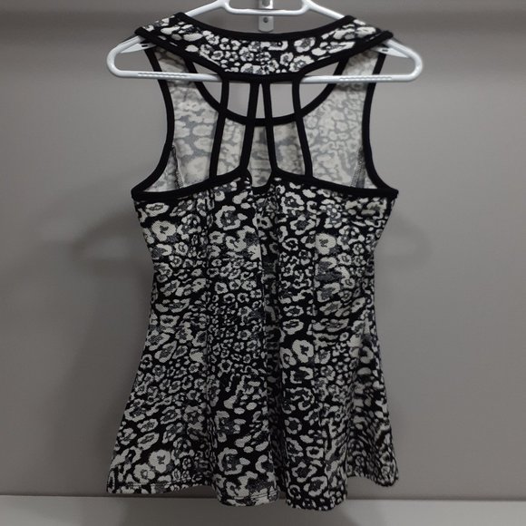 Black and white top with attractive strapping on back - Picture 2 of 2